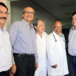 Ao lado de dirigentes do HE, Takimoto e Vander visitaram futuras novas salas