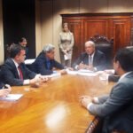 Vander, Puccinelli e o ministro César Borges durante a audiência